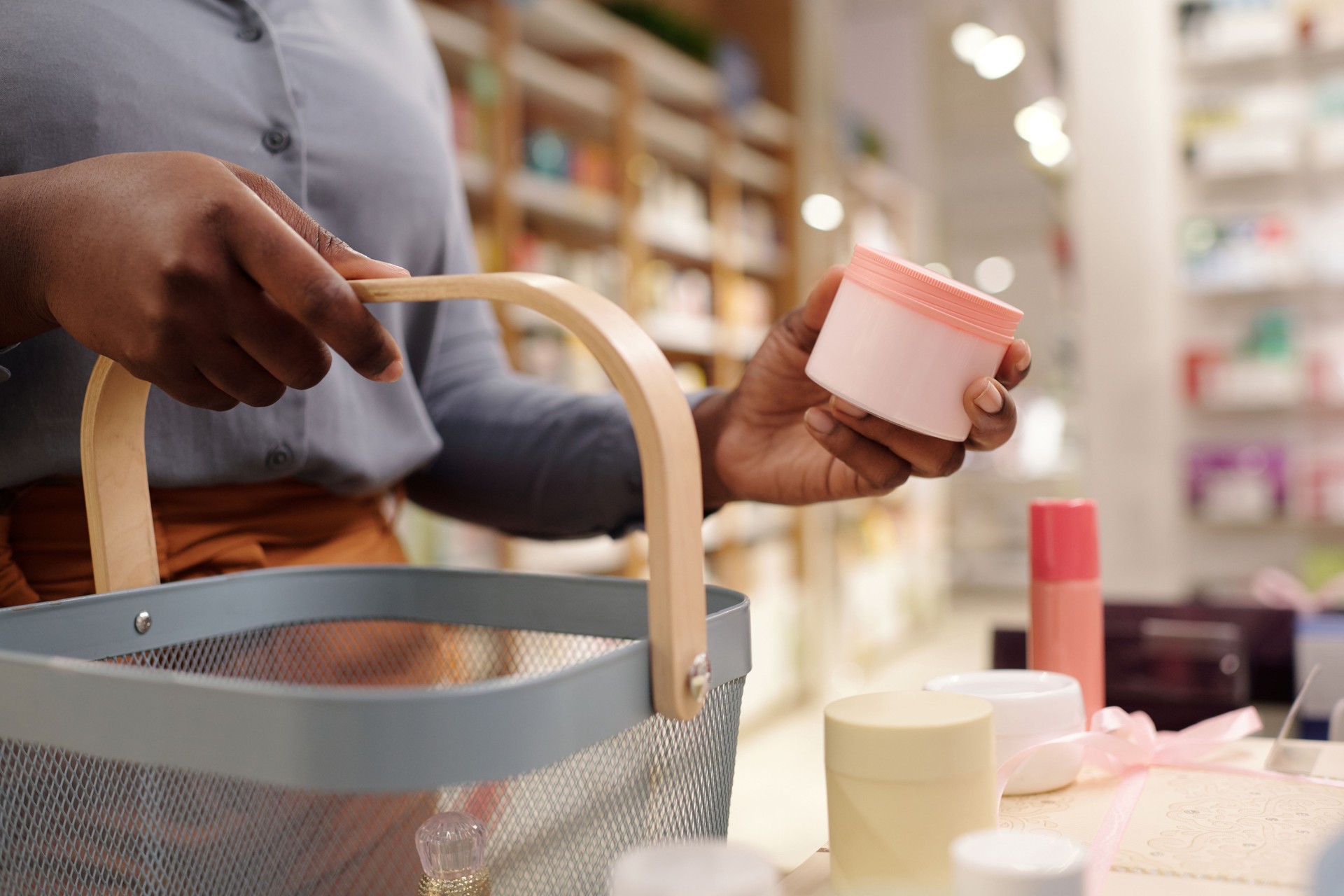 Female consumer with shopping basket